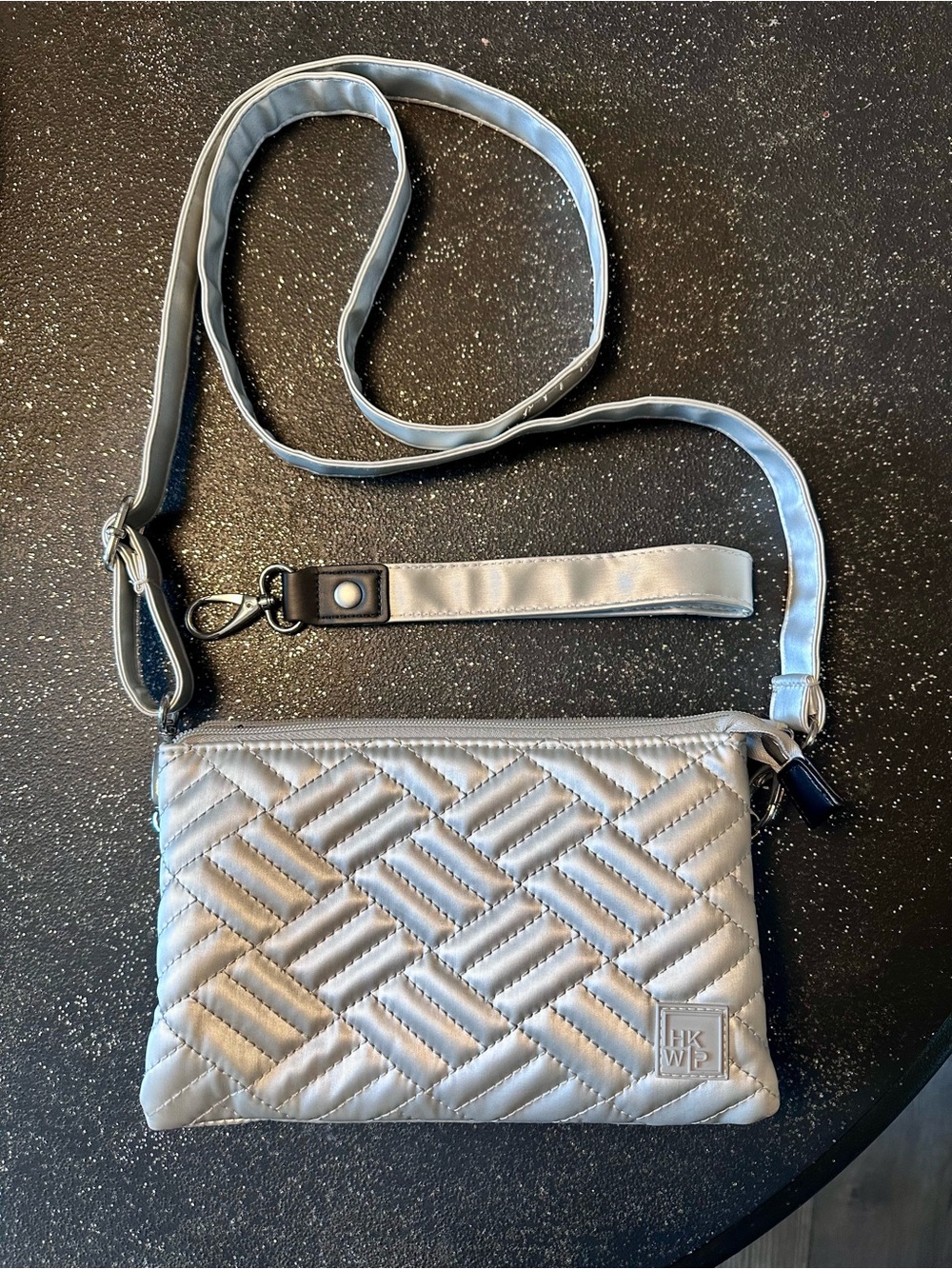 Silver Quilted Crossbody Bag by IHKWIP